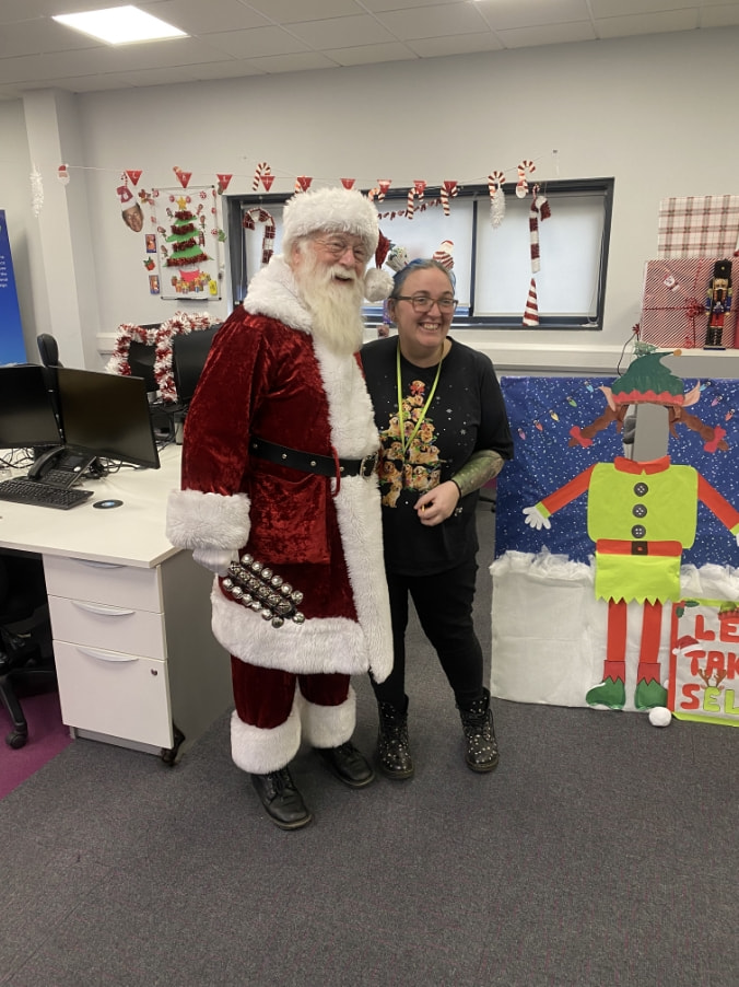 Birchall Foodservice employee with Santa