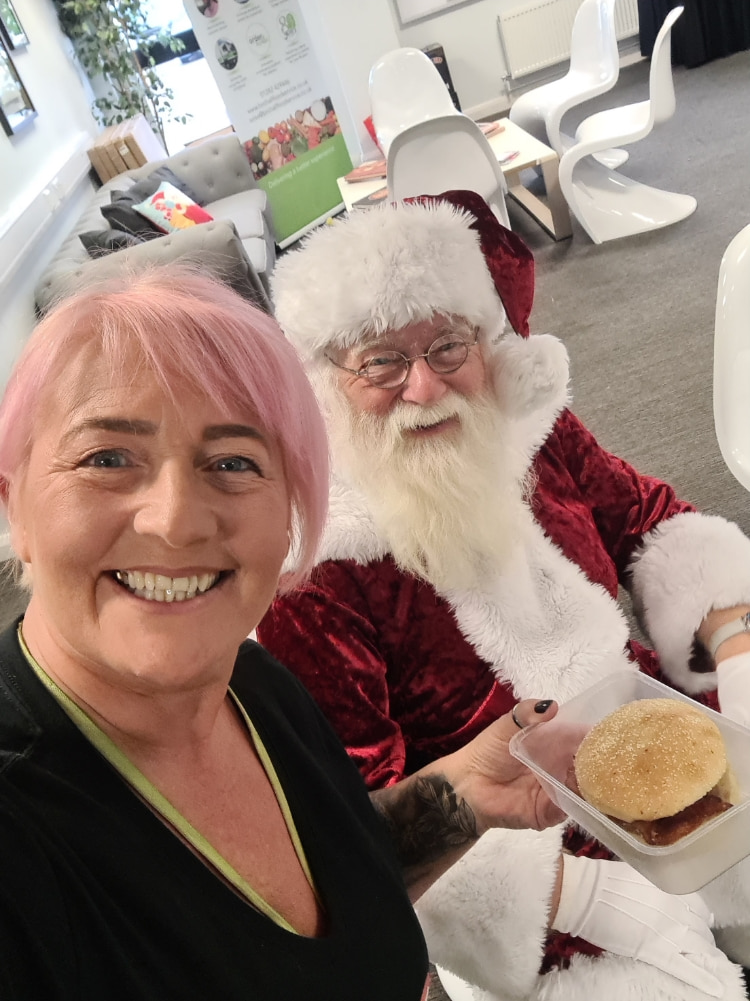 Birchall Foodservice employee with Santa